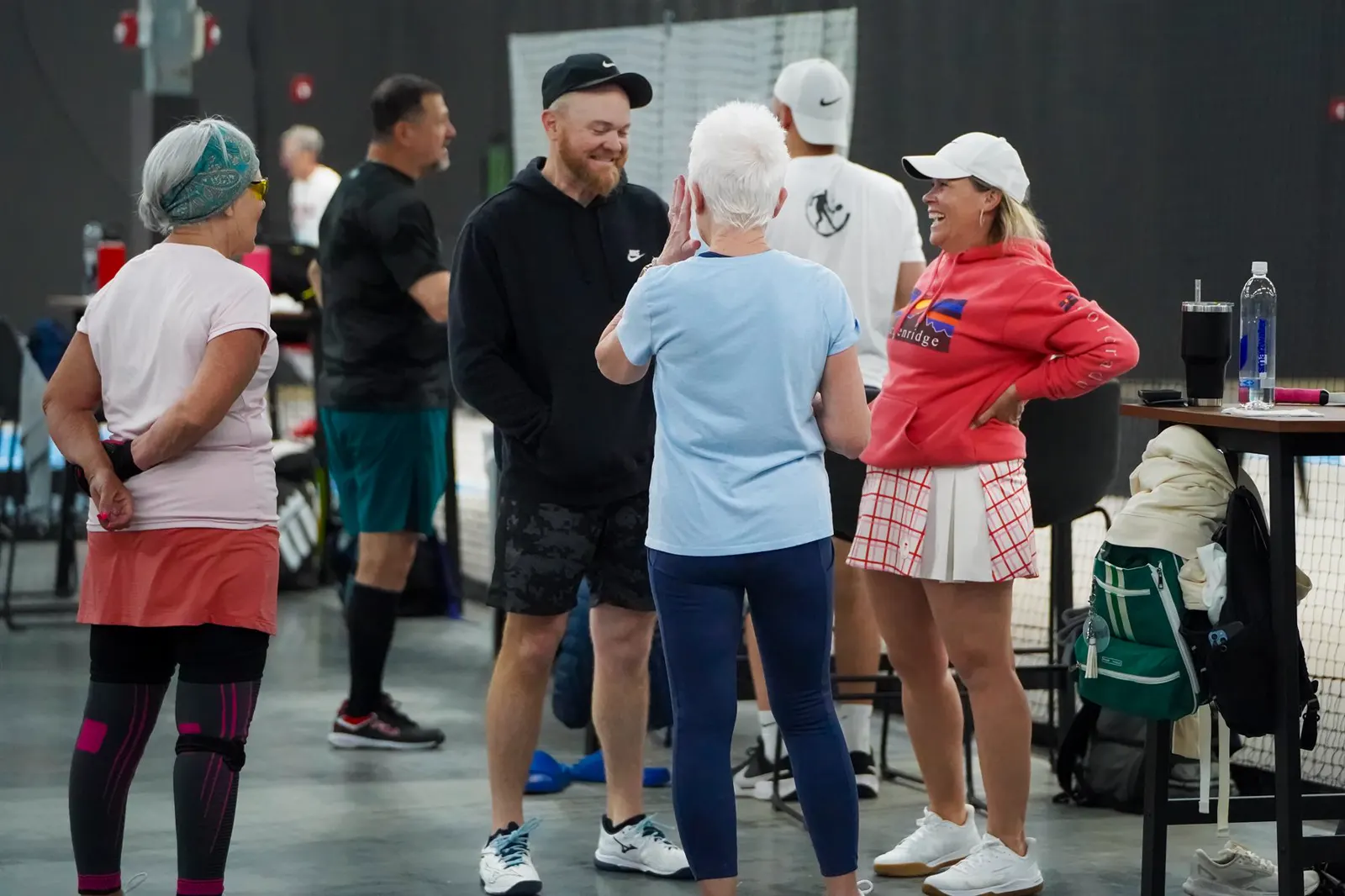Players gathered together between games at Carolina Pickleball Club